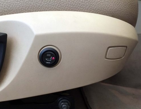 Asientos calefactables en BMW X1 Botón del asiento para la calefacción del coche BMW X1